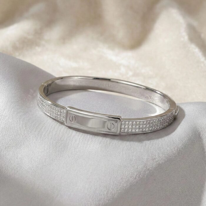 Unisex sterling silver bracelet with cubic zirconia detailing