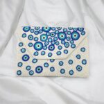 Everyday style statement with with evil eye bead work clutch | Cross body sling bag