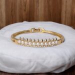 Elegant Gold-Tone Pearl & AD Stone Curved Bangle - Image 2