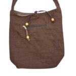 Close up of the cotton crossbody bag | Practical everyday use with zipper on the top and on the outside pocket.