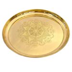 Close up of large brass plate for pooja and home decor