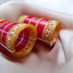 Traditional red bridal chura bangles with elephant kada