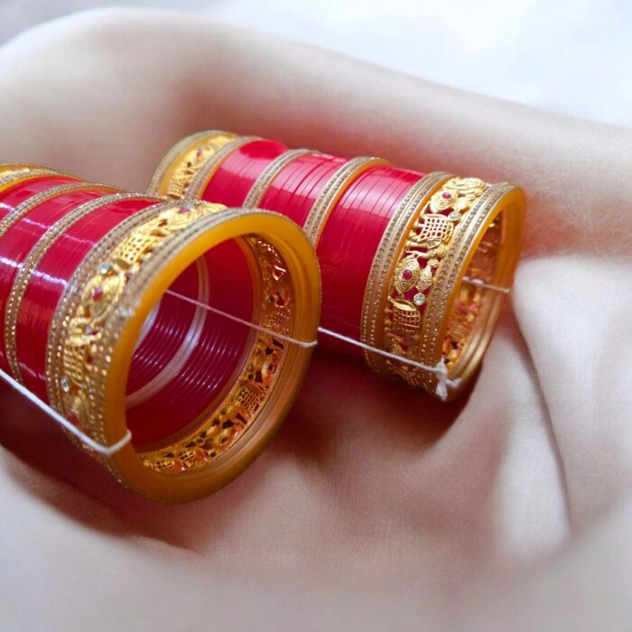 Traditional red bridal chura bangles with elephant kada