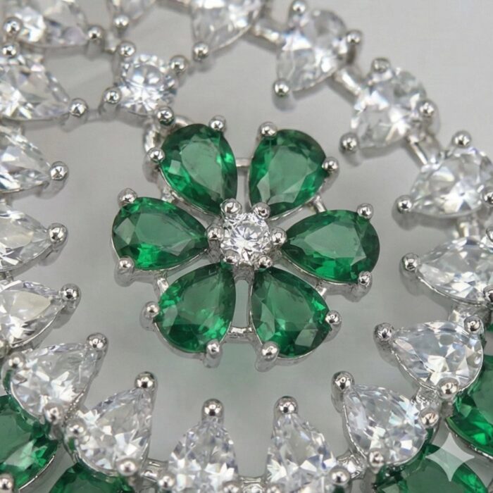 Emerald Green Earrings - Close up of the Emerald green floral stone detailing