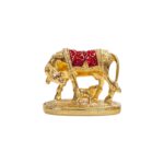 Close up of Kamdhenu Idol - Gold plated Small Statue