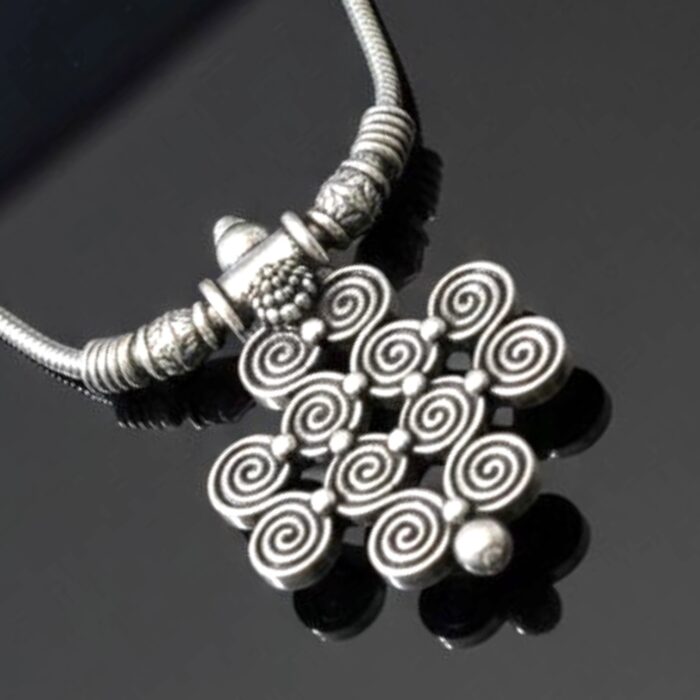 Nickel-free silver oxidized pendant close-up