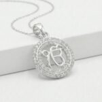 Ek Onkar sacred symbol silver pendant close-up