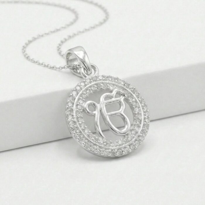 Ek Onkar sacred symbol silver pendant close-up