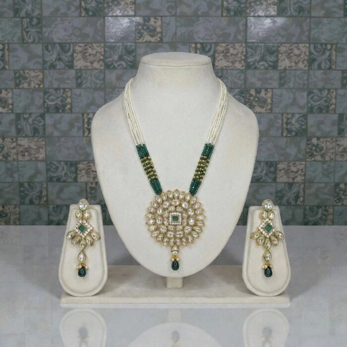 Swarnika Noor Rani Haar Set with green crystals and white pot beads