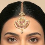 Traditional Kundan maang tikka with maroon AD diamond stone