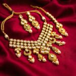 Swarnika Aira Kundan necklace set with earrings and Maang Tikka