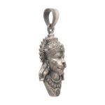 Side profile view of the silver pendant of Hanuman