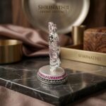 Pure silver idol with embedded zirconia stones