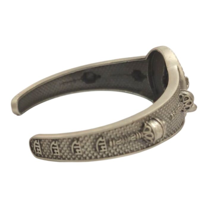 Side profile showcasing Ram Naam engraving on the bracelet