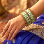 Glass Bangles studded with CYZ Stones - Golden with Lite Green