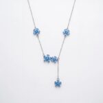 Close up of Multi flower Blue Zirconia Silver Necklace