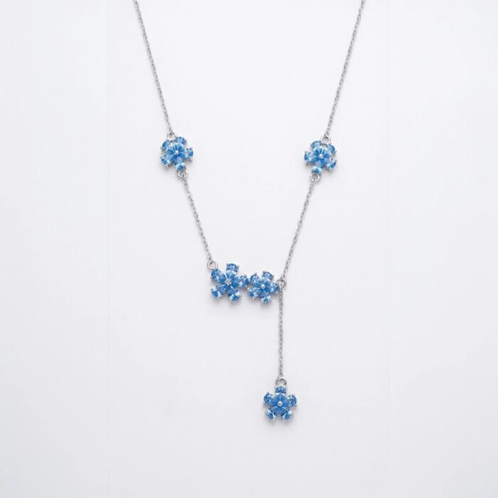 Close up of Multi flower Blue Zirconia Silver Necklace