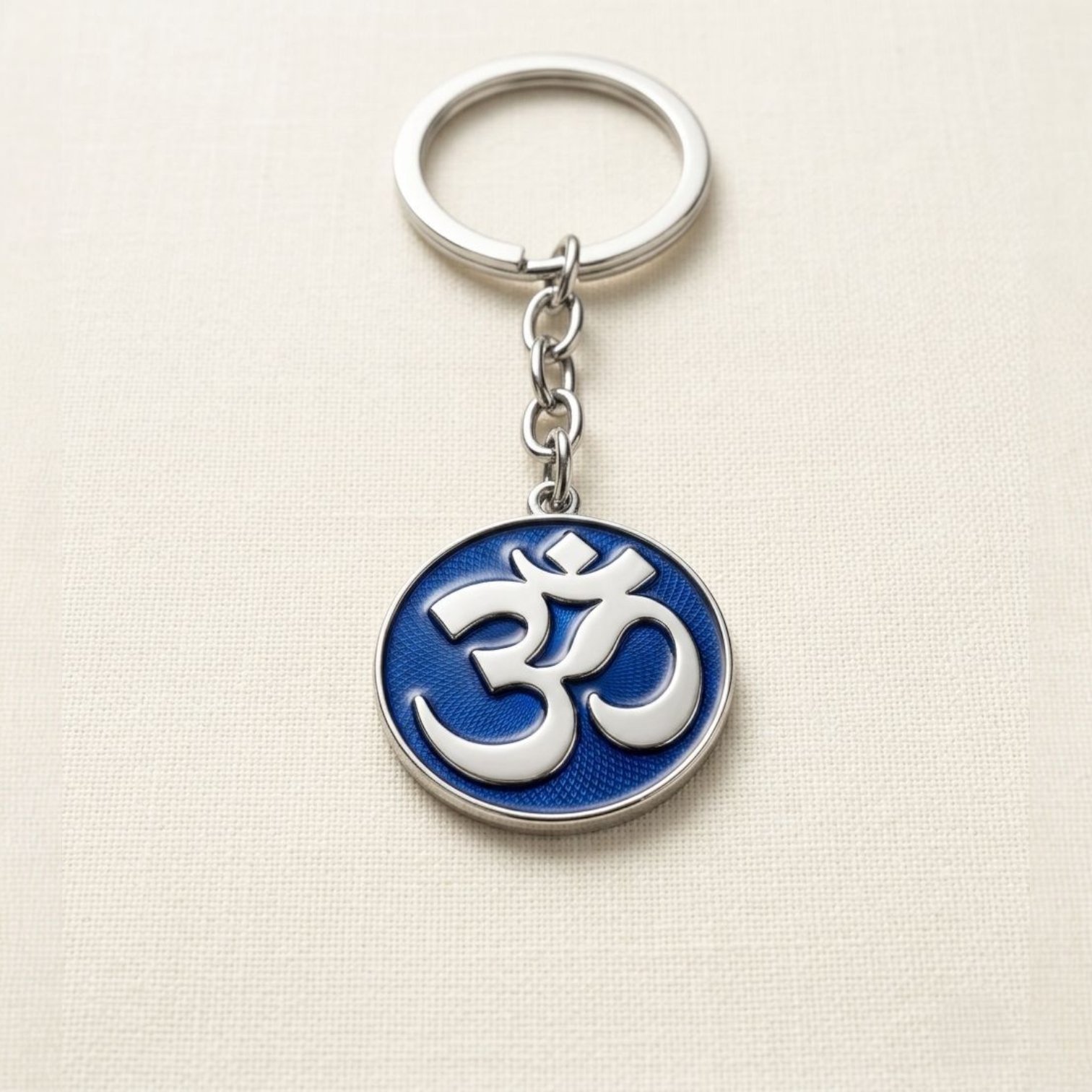 1779118340646.jpg Handcrafted OM Keychain - Blue | OM Hanging for car - Image 1