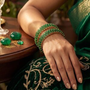 Traditional gold plated bangles with Green stones