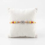 925 Sterling Silver Rakhi with embedded Zirconia stones on a Evil eye emblem