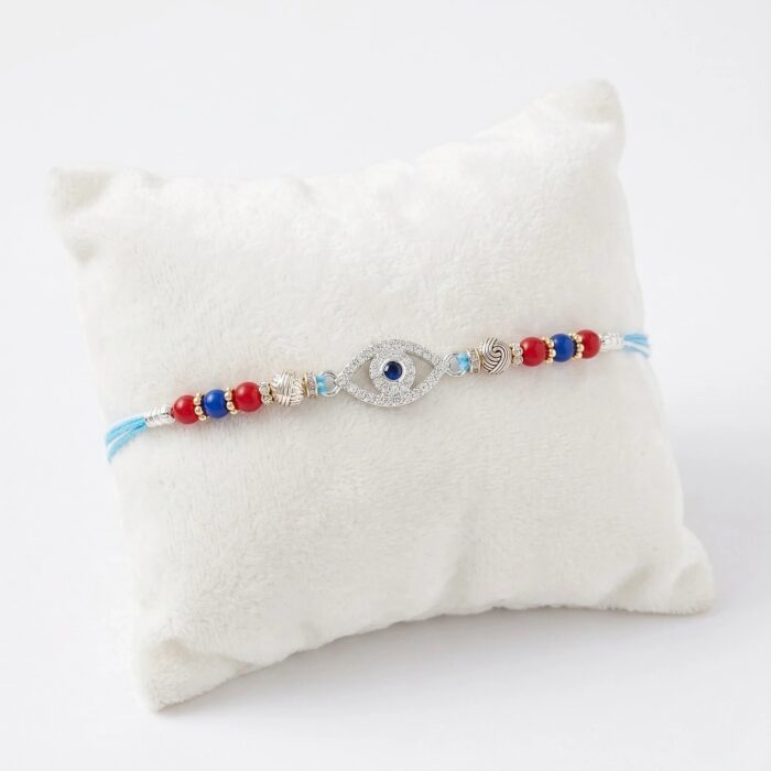 925 Sterling Silver Rakhi with embedded Zirconia stones on a Evil eye emblem