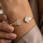 Close up of the embedded zirconia stones in this rose gold finish - 925 sterling silver bracelet
