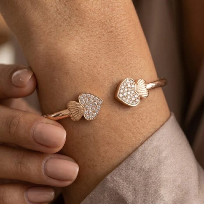 Close up of the embedded zirconia stones in this rose gold finish - 925 sterling silver bracelet