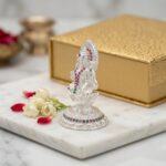 Side profile view of Pure silver Lakshmi Idol with embedded stones