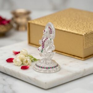 Side profile view of Pure silver Lakshmi Idol with embedded stones