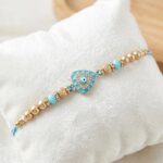 Premium evil eye Rakhi with Cz stones and meena work