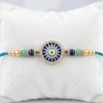Blue Evil Eye Rakhi with Sparkling CZ Stones on Decorative Thread