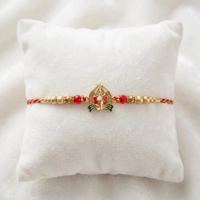 Close up of the Premium Ganesh Rakhi on beetel leaf