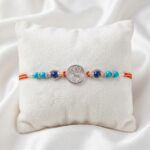 Order online 925 solid silver rakhi with Ganesha