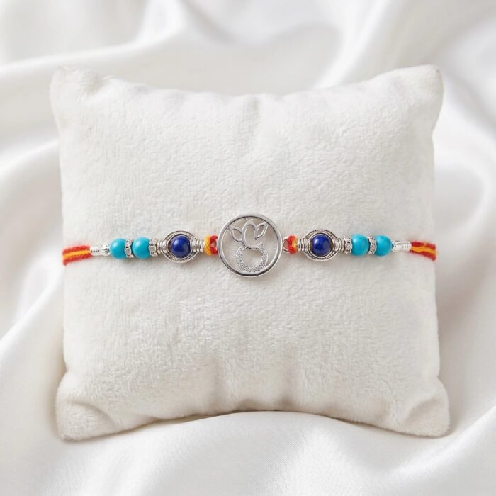 Order online 925 solid silver rakhi with Ganesha