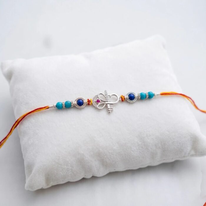 Send Sterling silver Rakhi with Ganesha