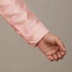 Close up of buttoned Cuff on Kurta