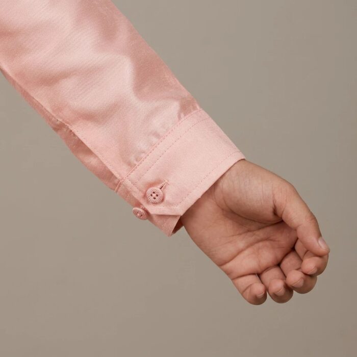 Close up of buttoned Cuff on Kurta
