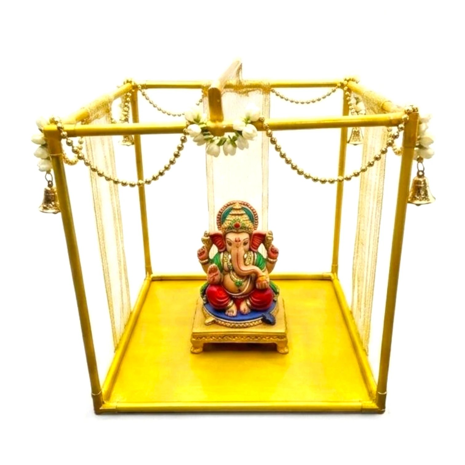 Ganpati setup in gold frame 15 inch gold metal Ganpati makhar frame decorated with marigold garlands and a home Ganesh idol