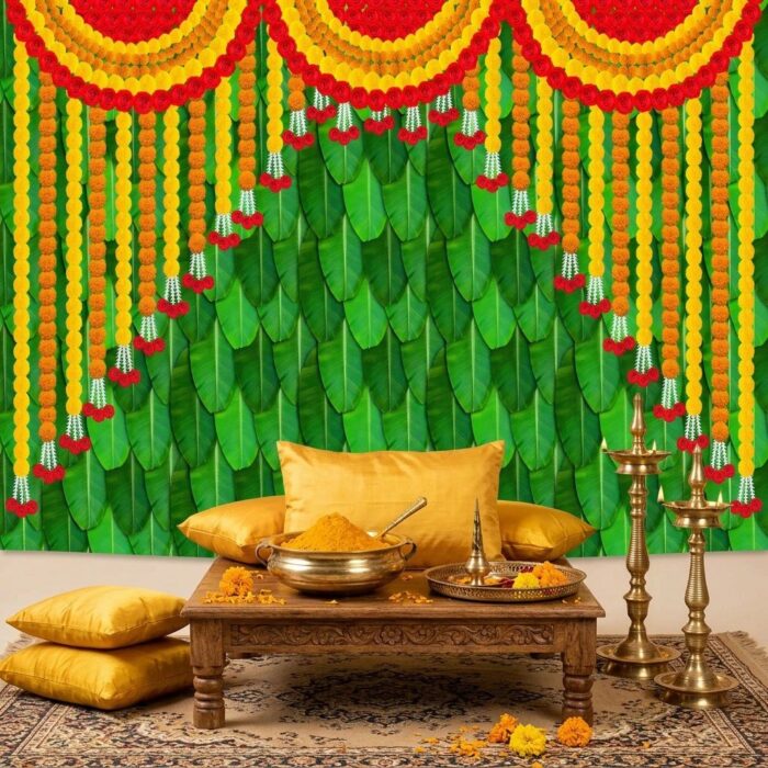 Close-up of banana leaves with marigold strings design — lush Kele Patta with orange-yellow marigold printed garlands pattern