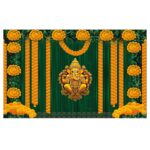 Close-up of Ganesha marigold backdrop design with orange yellow marigold garlands, sunflowers and green leaves print
