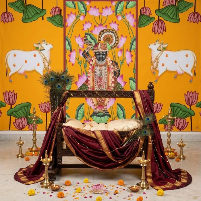 Close-up of Shrinath Ji Pichwai backdrop showing Nathdwara gold shringaar, cows and lotus flower border design