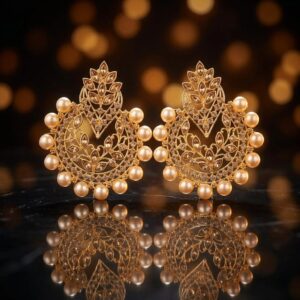 Gehna chandbali earrings on reflective surface