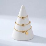 Elegant 925 Sterling Silver Gold-Plated Triple Heart Bracelet - Image 3
