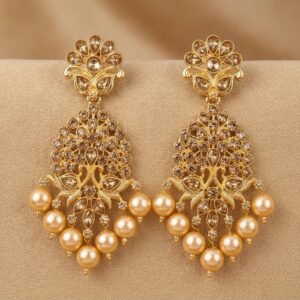 7 cm gold-tone drop earrings styled on champagne silk