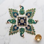 Decorative metal rangoli set for entryway, mantel, pooja room or festive table styling.