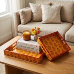 Mustard yellow with floral print on this wooden tray set of 2