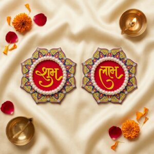 Small sized Shubh Labh laid out in a marigold rangoli