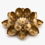 Top view of 12-petal gold lotus diya holder for Diwali decoration