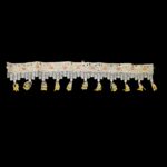 Close-up of golden mirror toran embroidery — real glass sheesha, gold zari, faux pearls and hand-beaded red and yellow flower with pearl and yellow tassel