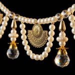 Pearl toran bandhanwar with ivory pearls antique gold lotus charms